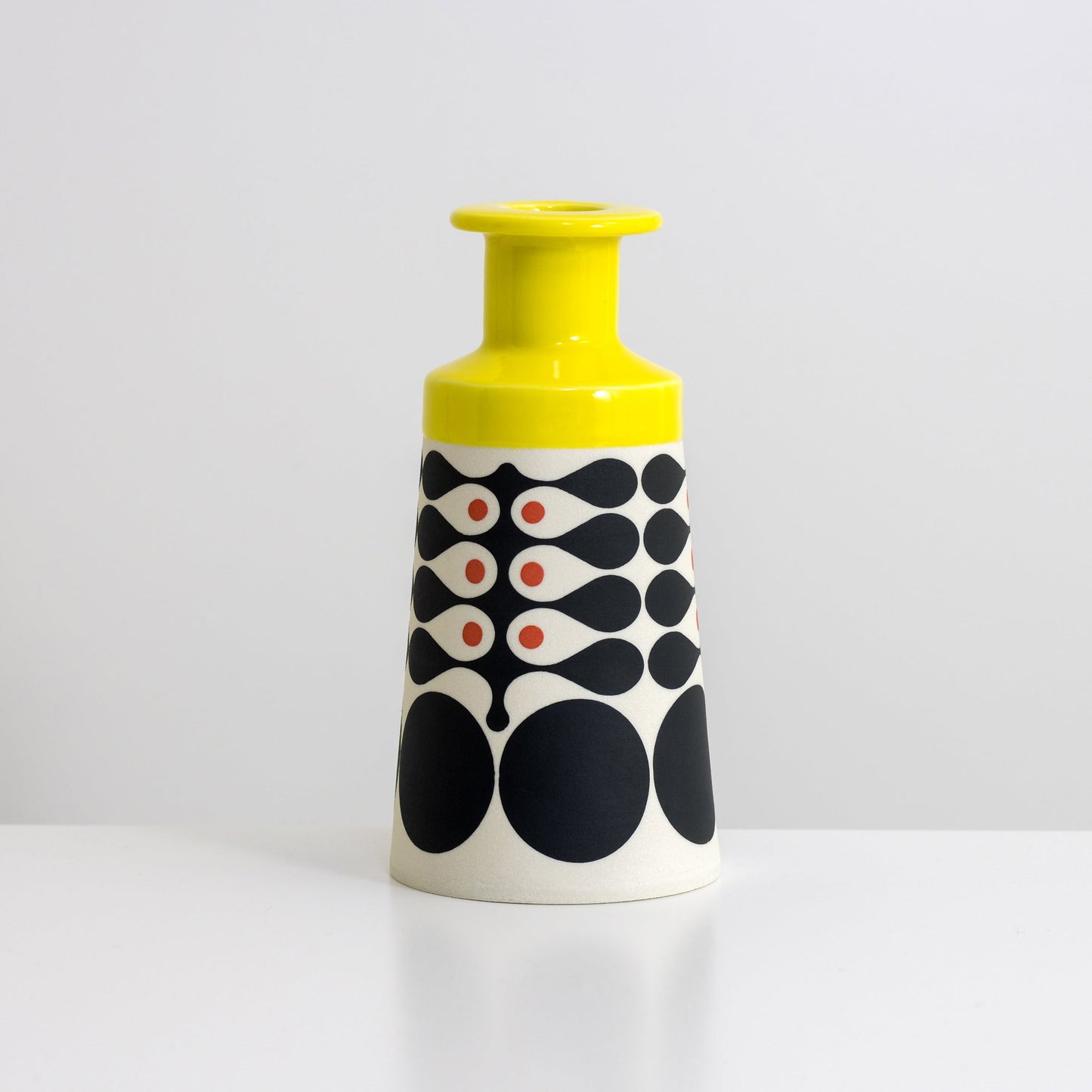 Cone Bottle with yellow glaze, vertical seaweed pattern in black