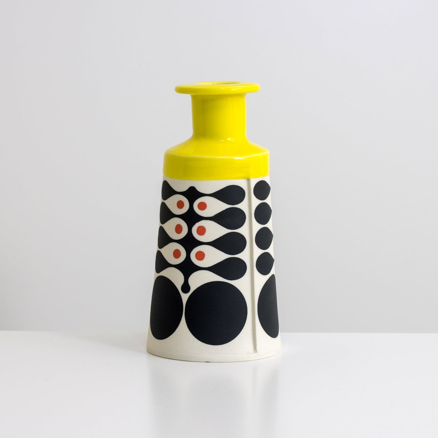 Cone Bottle with yellow glaze, vertical seaweed pattern in black